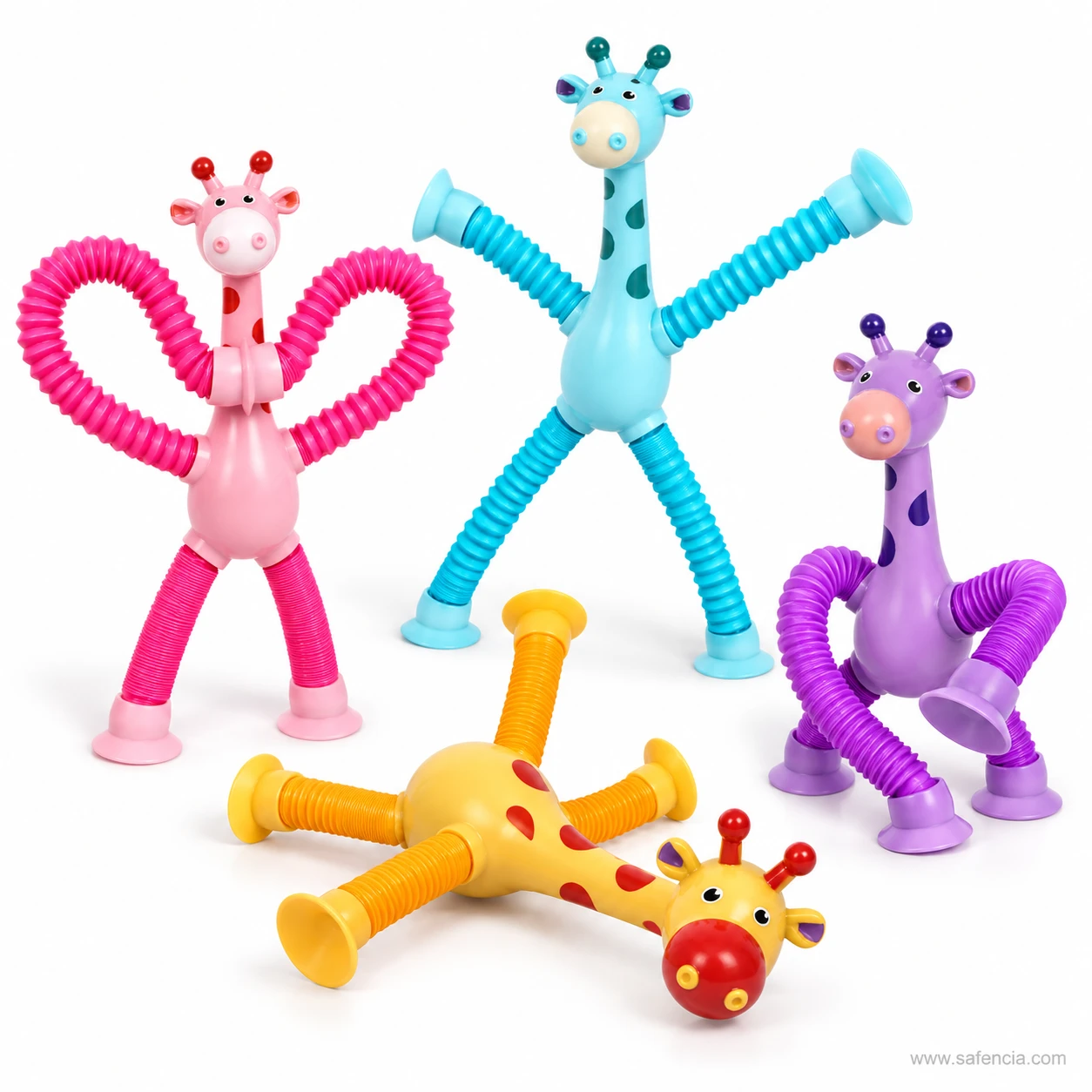 Pink, blue, purple and yellow giraffe pop tube toys stretched in different ways, one lying down