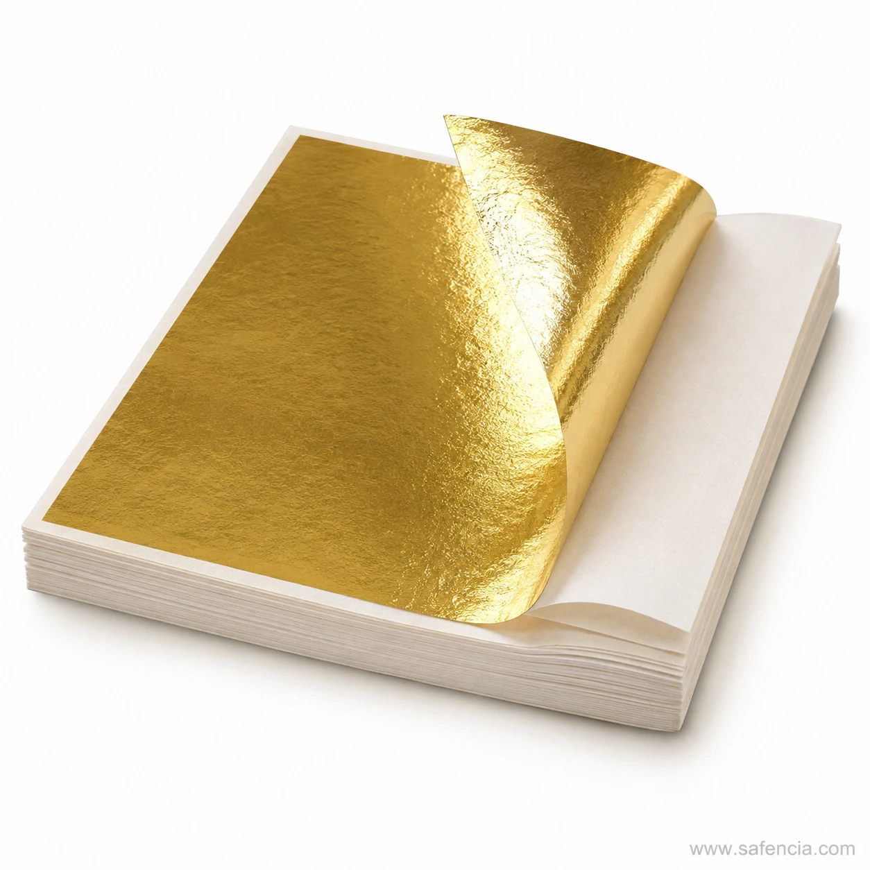 Gold leaf sheet turned back over the stack of gilding leaves