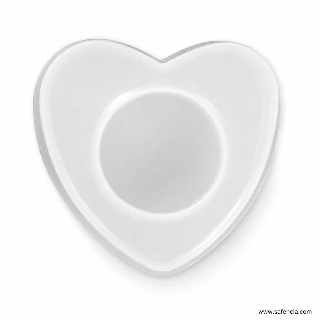 Close view of the circular cavity inside the heart-shaped silicone mould