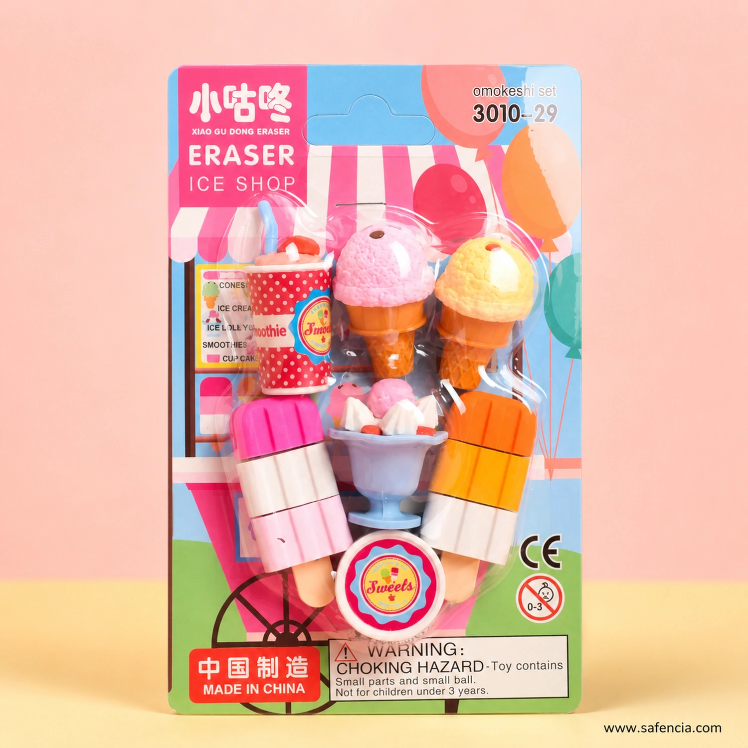 Straight-on view of the Eraser Ice Shop card showing the printed shop awning, balloons, menu board and the CE and warning text