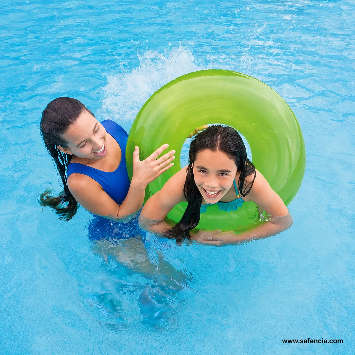 Children using a lime Intex Fluorescent Transparent Swim Ring in a swimming pool