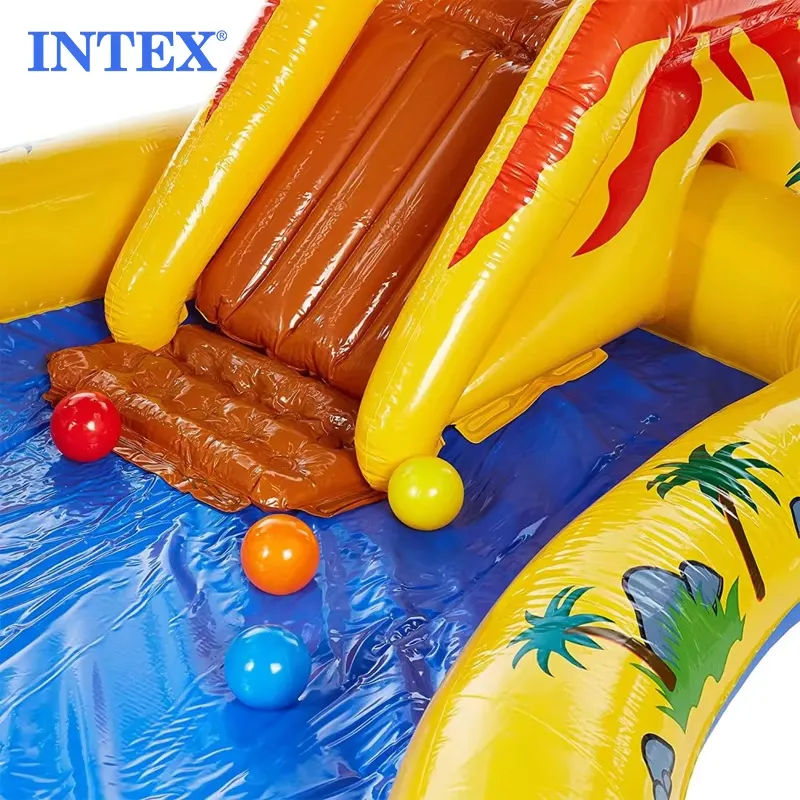 Close-up of the Intex Little Dino water slide and colourful play balls floating in the blue pool