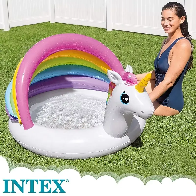 Intex Unicorn Baby Pool shown filled with water on a lawn with an adult beside it for scale