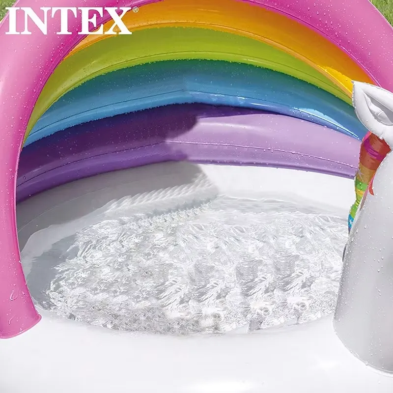 Close-up of the Intex Unicorn Baby Pool water and rainbow canopy with the textured inflatable floor