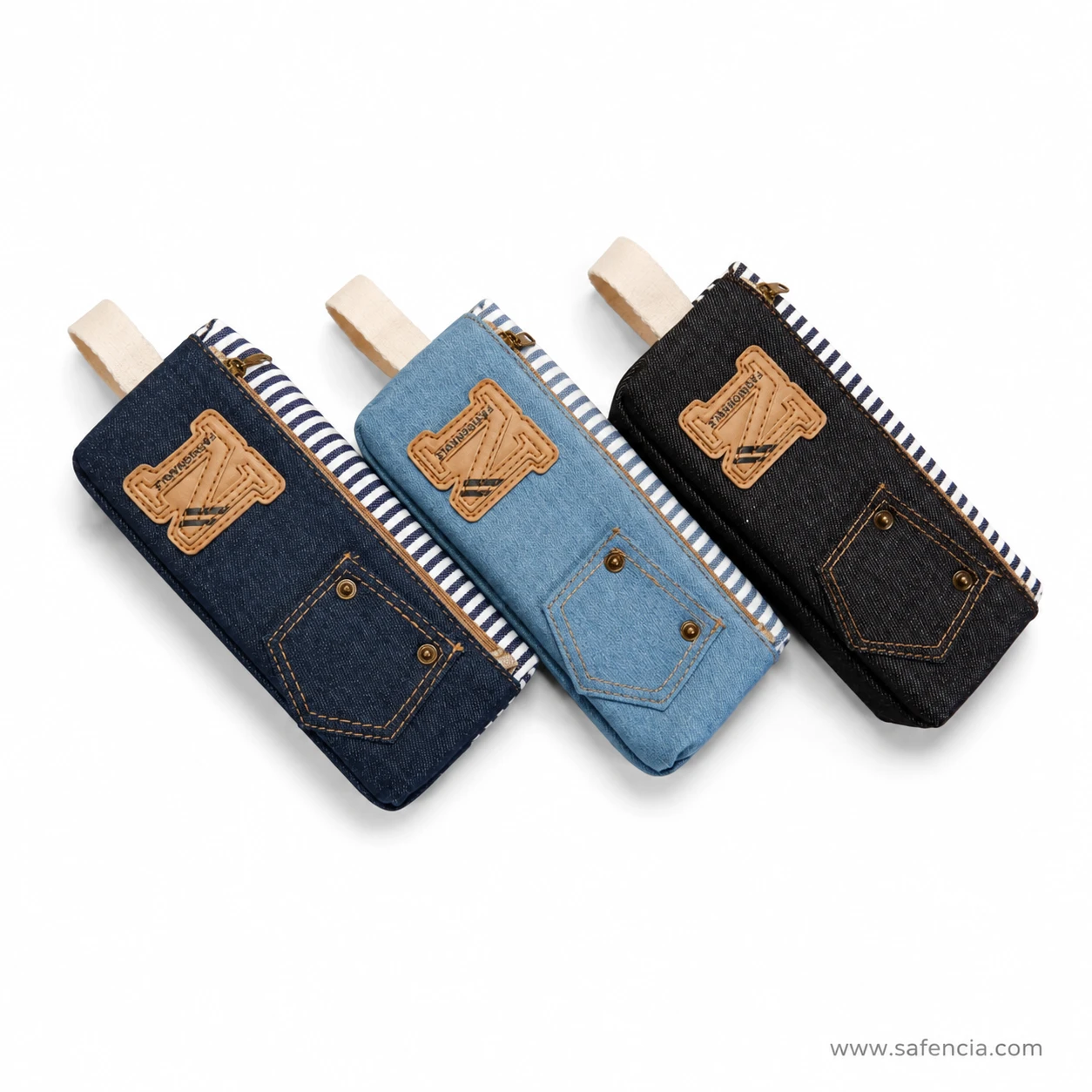 Three denim pencil pouches in dark indigo, stonewash blue and black