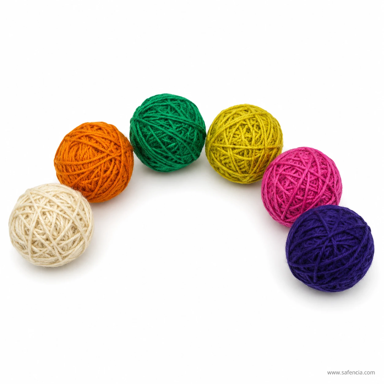 Dyed jute twine balls arranged to show the full colour range
