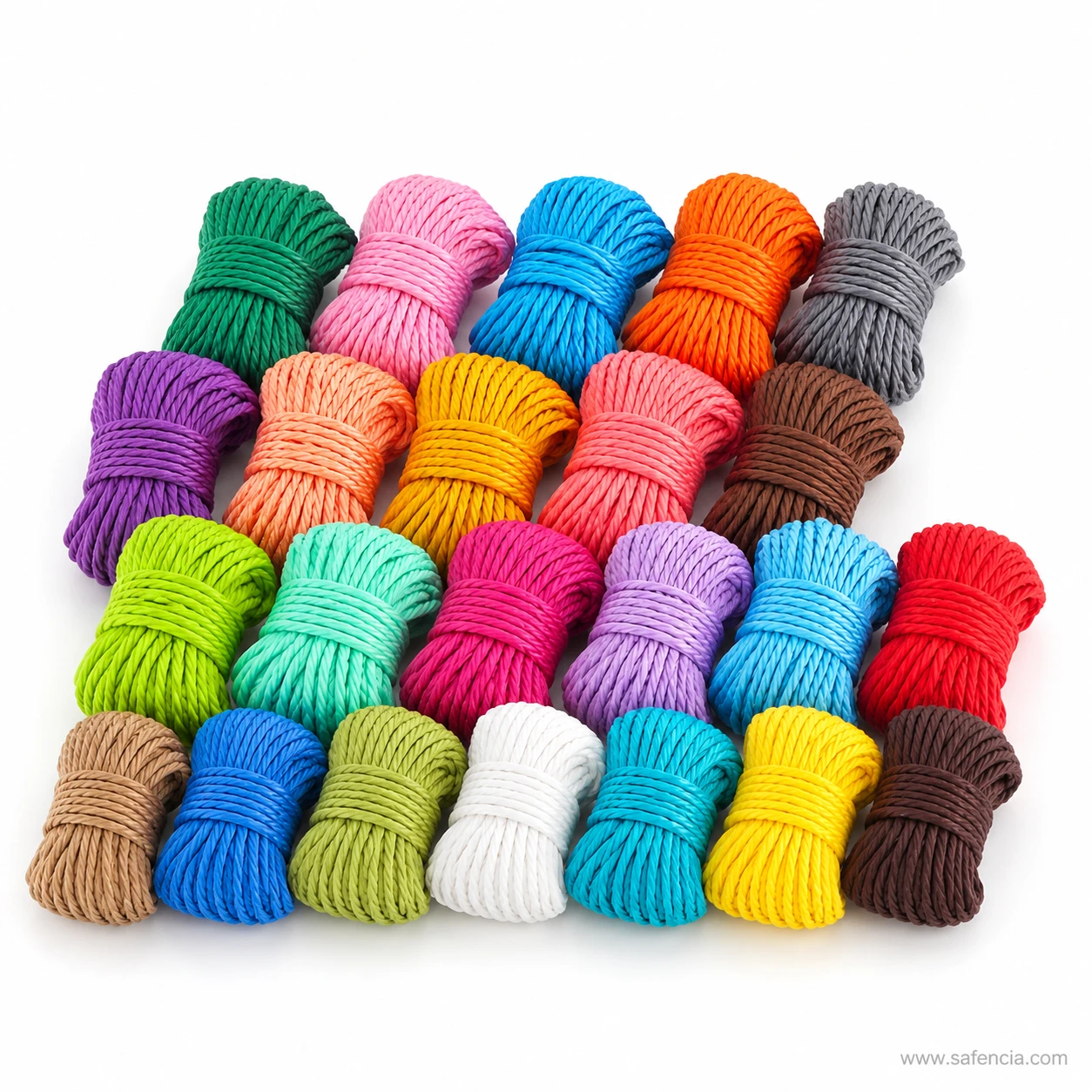 Imported jute roll bundles laid out flat in rows showing individual dyed shades