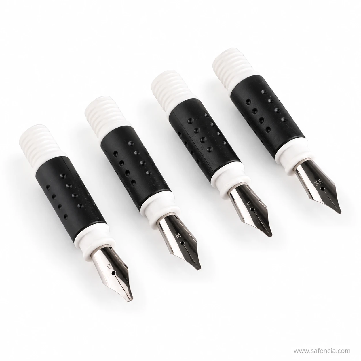 Close view of the broad-edge italic nib units from the Keep Smiling calligraphy pen set