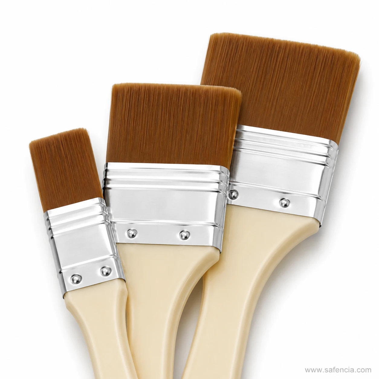 Close view of the wide flat heads and riveted ferrules on gesso brushes