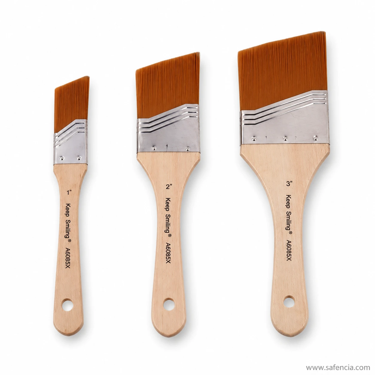 Three gesso brushes standing in order showing the 1, 2 and 3 inch widths