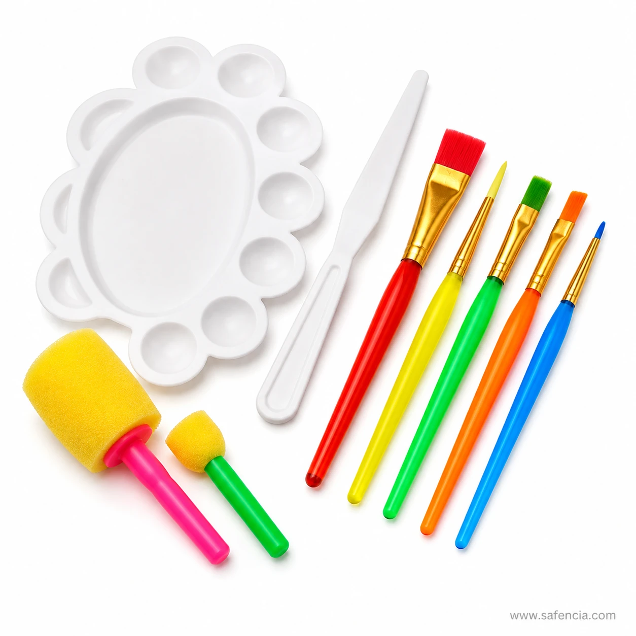 Keepsmiling brush set laid out with the palette, knife, five brushes and two foam daubers alongside