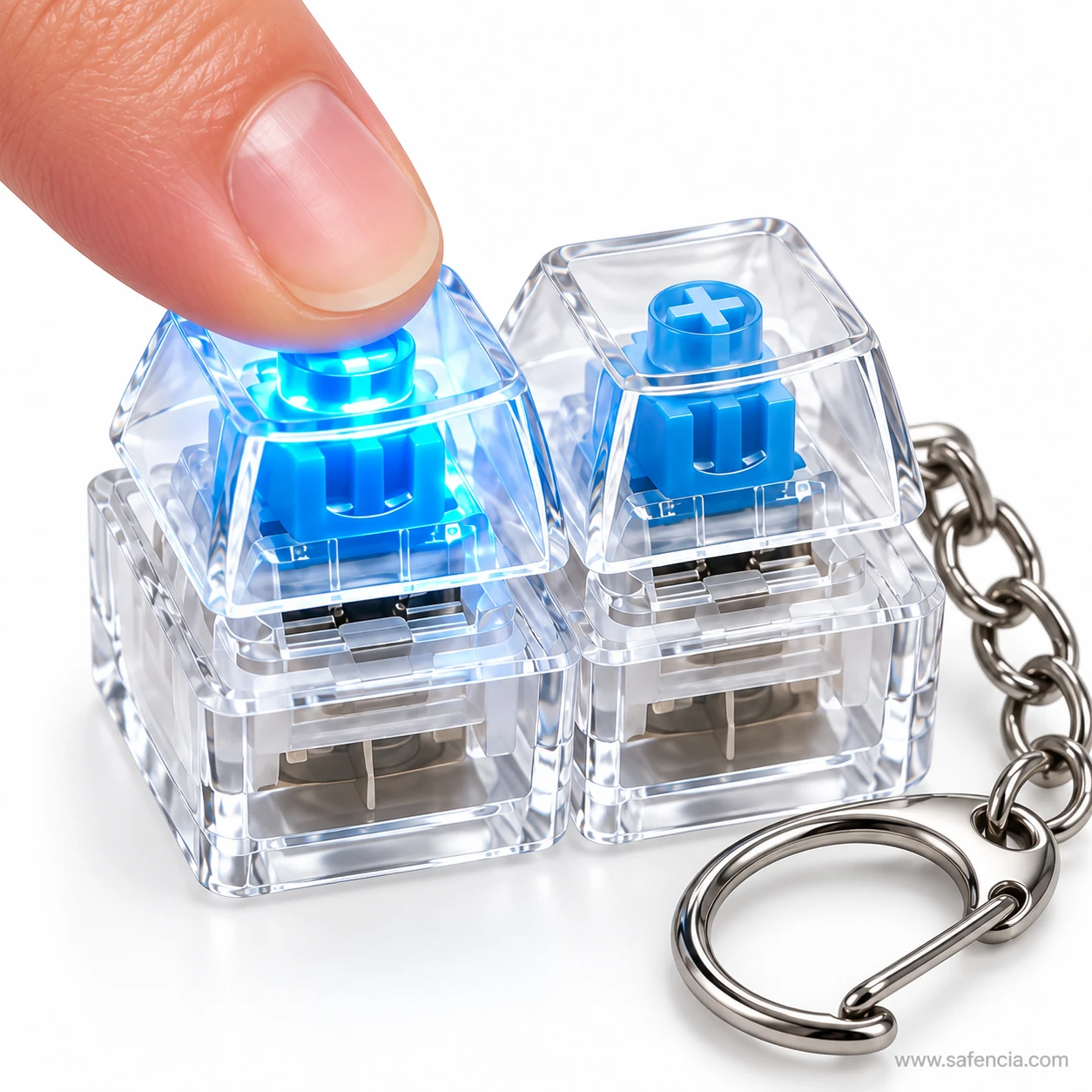 Close view of a finger pressing a glowing blue key on the keyboard clicker keychain