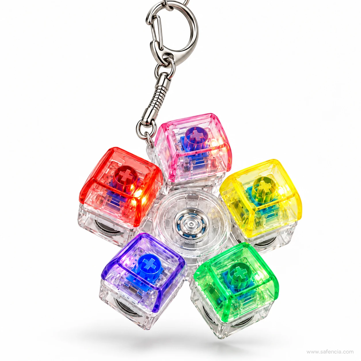Keyboard keychain fidget spinner hanging from its metal keychain and spring clip