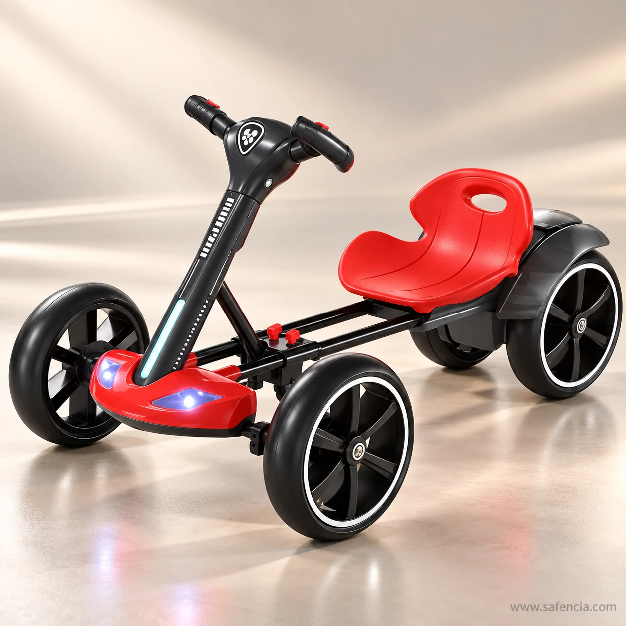 Red and black kids electric drift kart on a glossy studio floor with its front light on