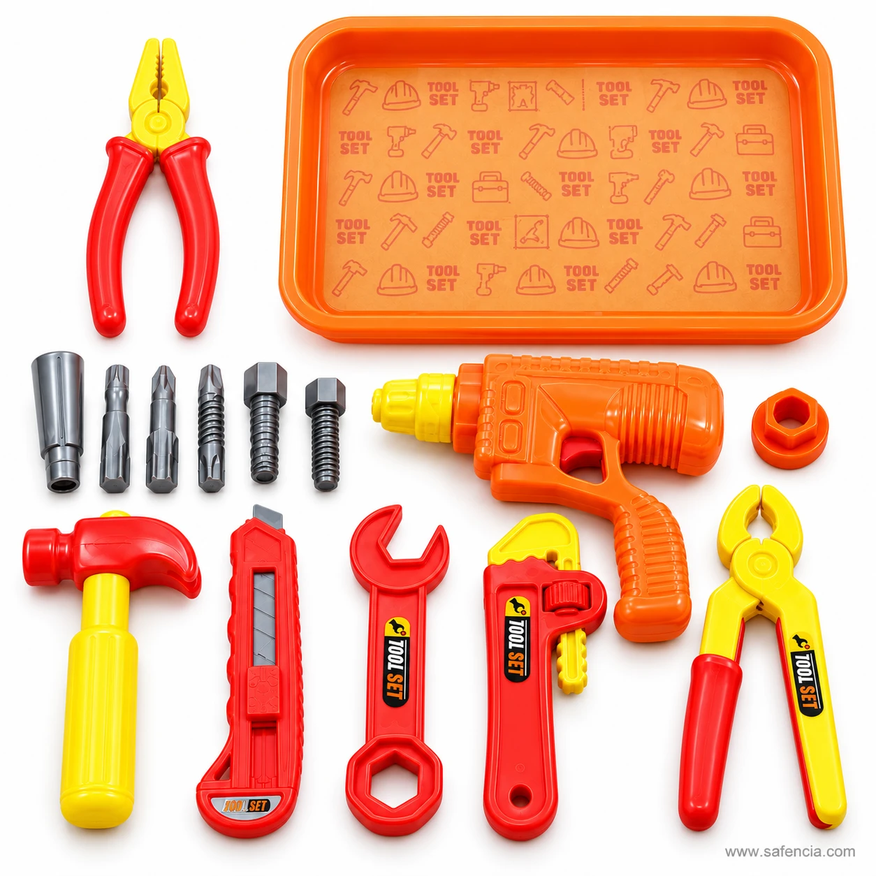 Every piece of the kids tool set laid out: empty tray, two pliers, bits and bolts, drill, nut, hammer, cutter and wrenches