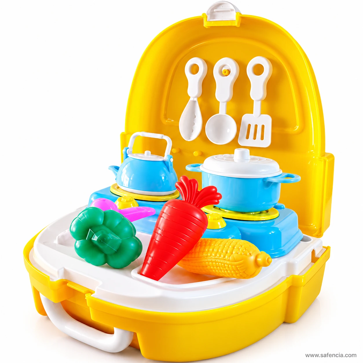 Close view of the Little Chef kitchen showing the blue kettle and cooking pot on the stove behind the pretend vegetables