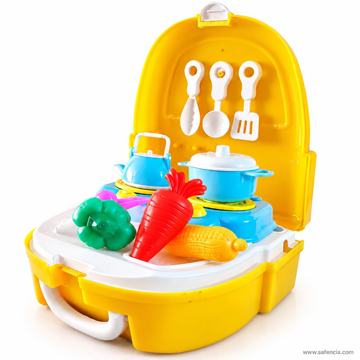 Little Chef toy kitchen open on its white worktop, with a pepper, carrot and corn in front of the blue two-burner stove