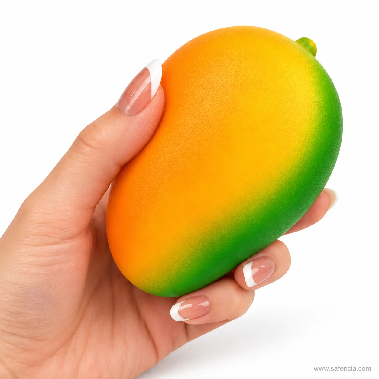 Mango squishy held in an open adult hand to show that it fills the palm