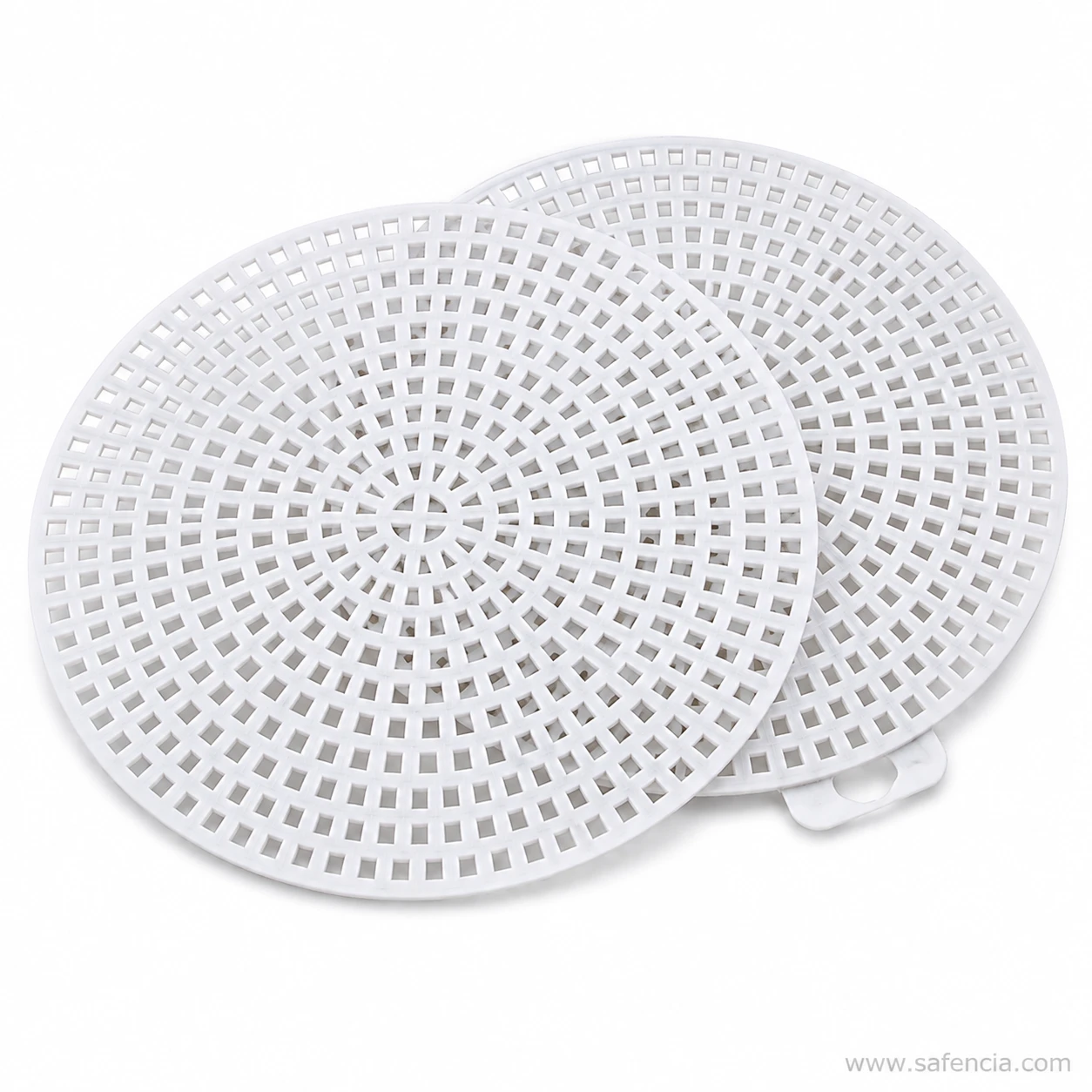 Square hole grid detail on a round plastic canvas mesh disc