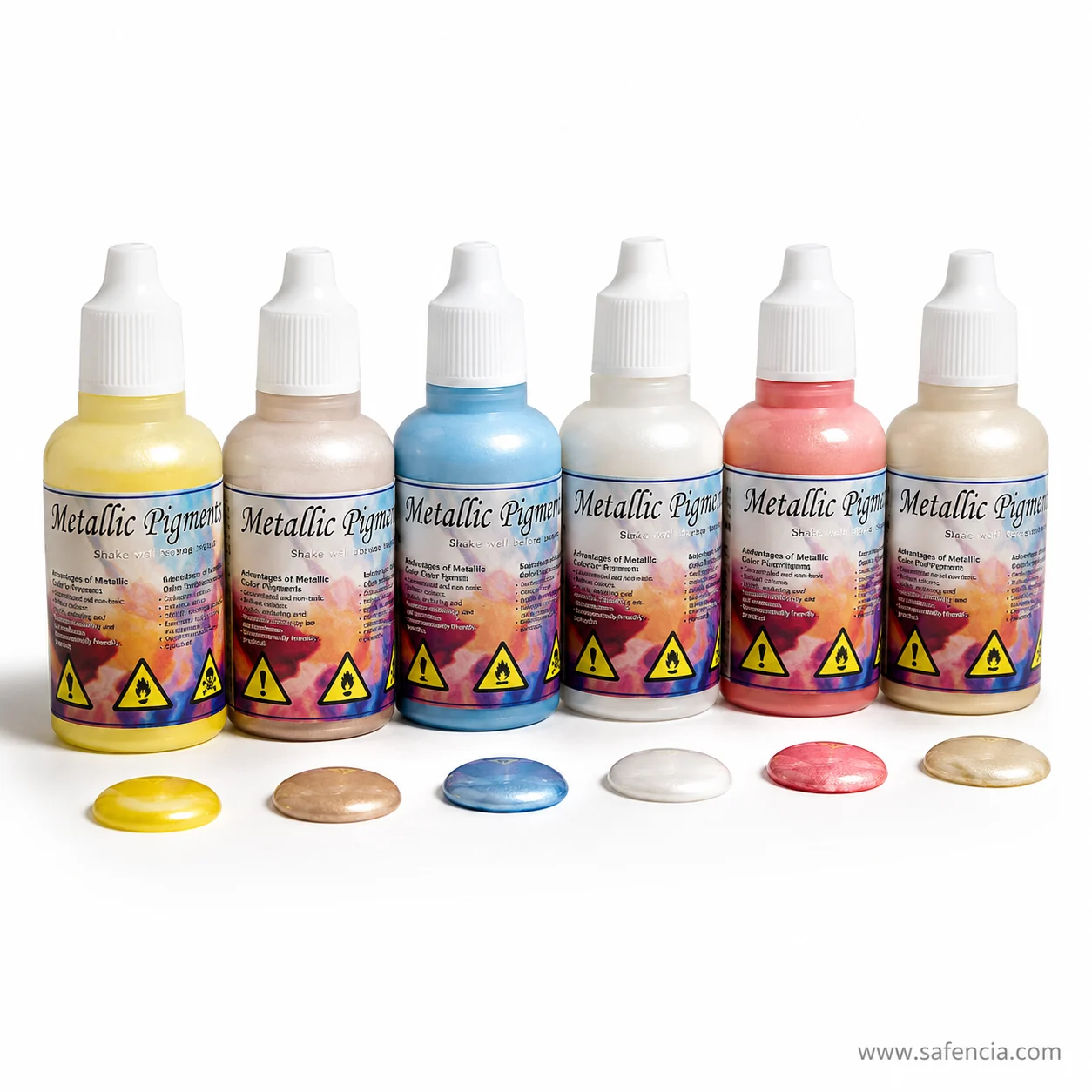 Six metallic pigment dropper bottles with each colour poured out as a glossy puddle in front