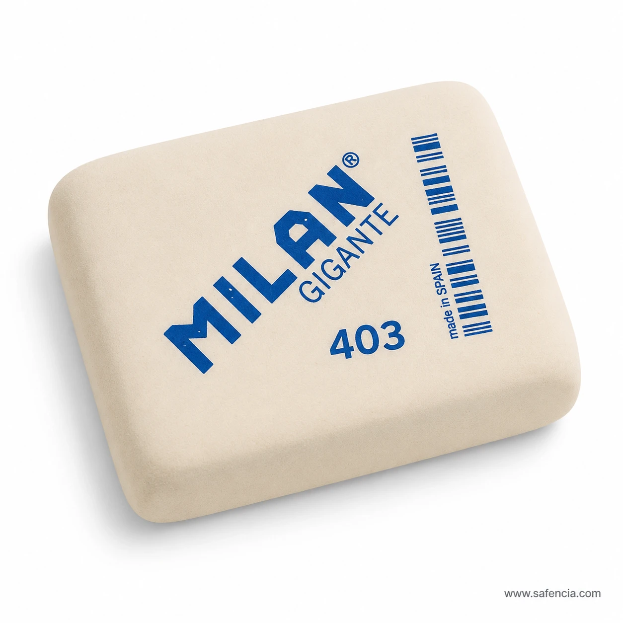 Milan Gigante 403 eraser photographed at an angle against white, with MILAN GIGANTE, 403, made in SPAIN and a vertical barcode printed in blue on the cream rubber