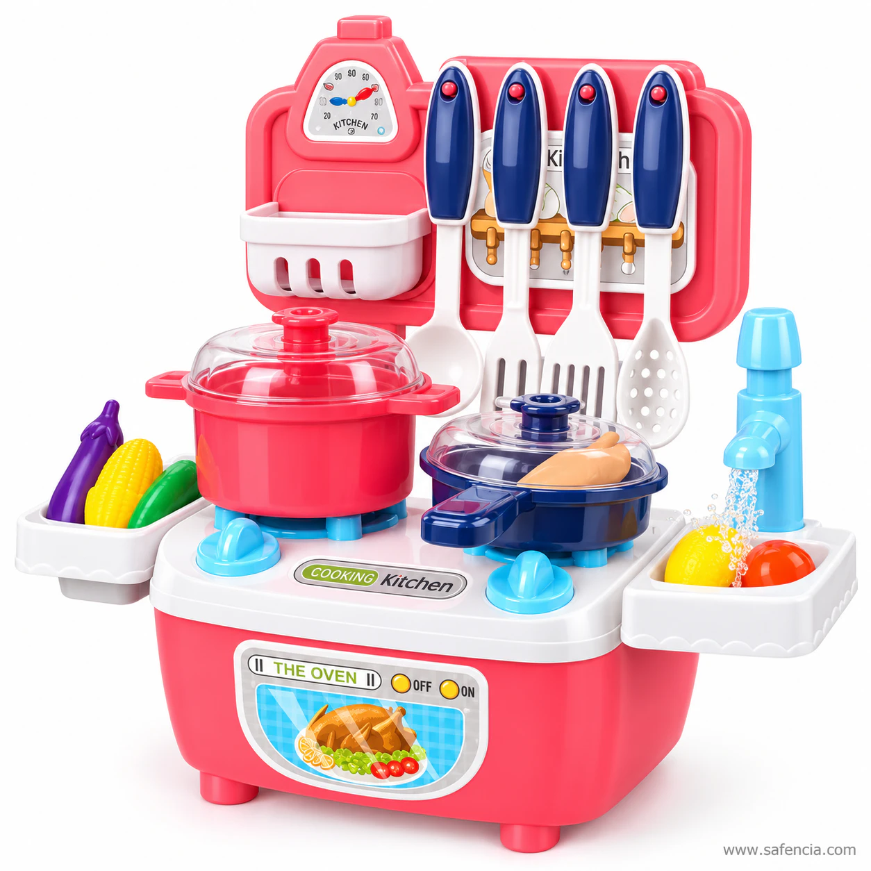 Pink mini kitchen set with the frying pan on the right ring, the clock dial above and the sink tray beside the stove