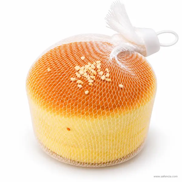 Mini Sponge Cake Squishy in Mesh Net — Soft Cake Squeeze Toy