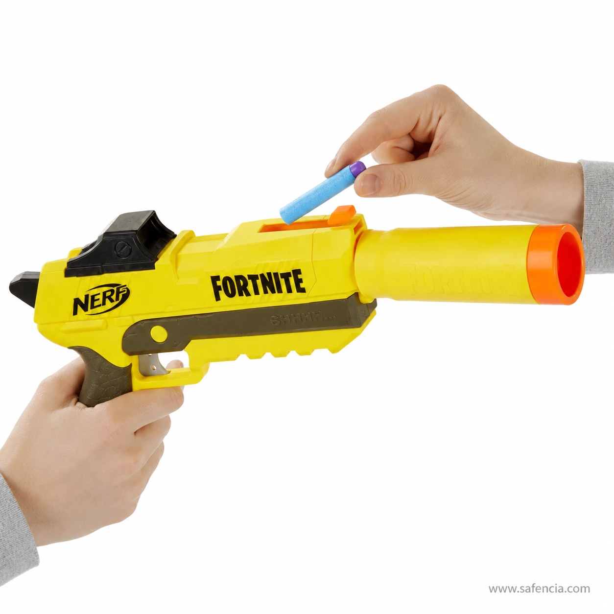 Hands holding the Nerf Fortnite SP-L and dropping a blue Elite dart into the top loading slot