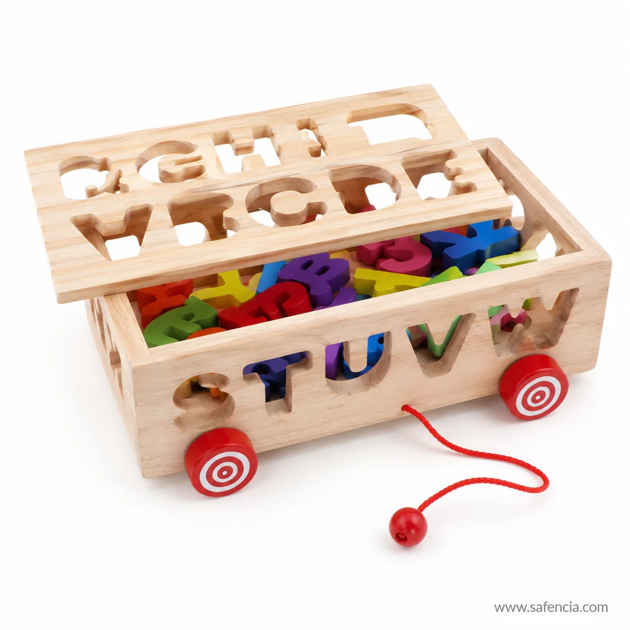 Wooden letter box lid showing the cut alphabet openings and the red pull cord
