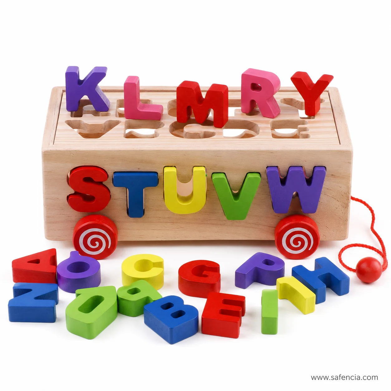 Wooden letter box on its red wheels with loose coloured capitals in front
