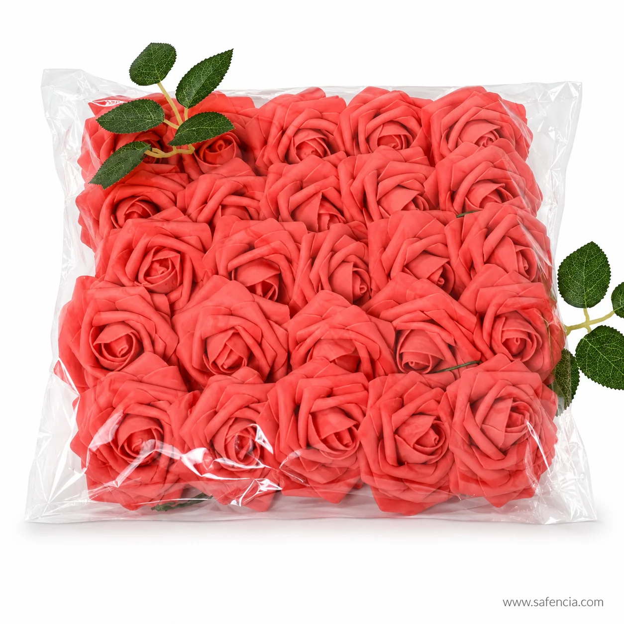 Red foam roses in their bag with the green leaf sprays visible at both sides