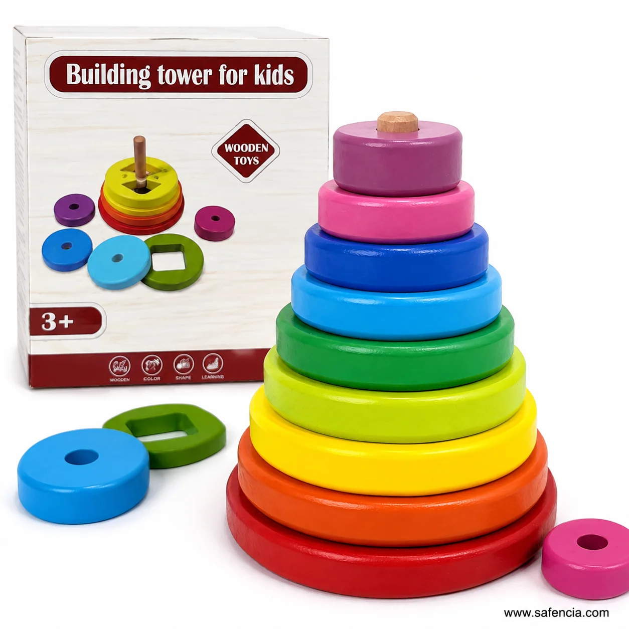 Building tower for kids printed carton marked 3+ beside the assembled wooden disc stacker
