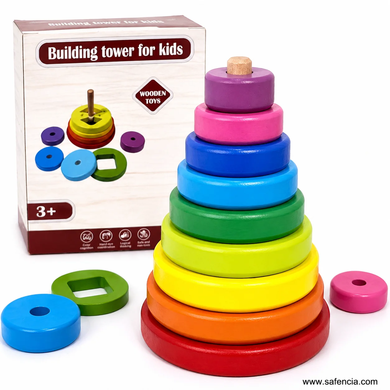 Assembled disc stacker with three further wooden discs lying loose beside the tower