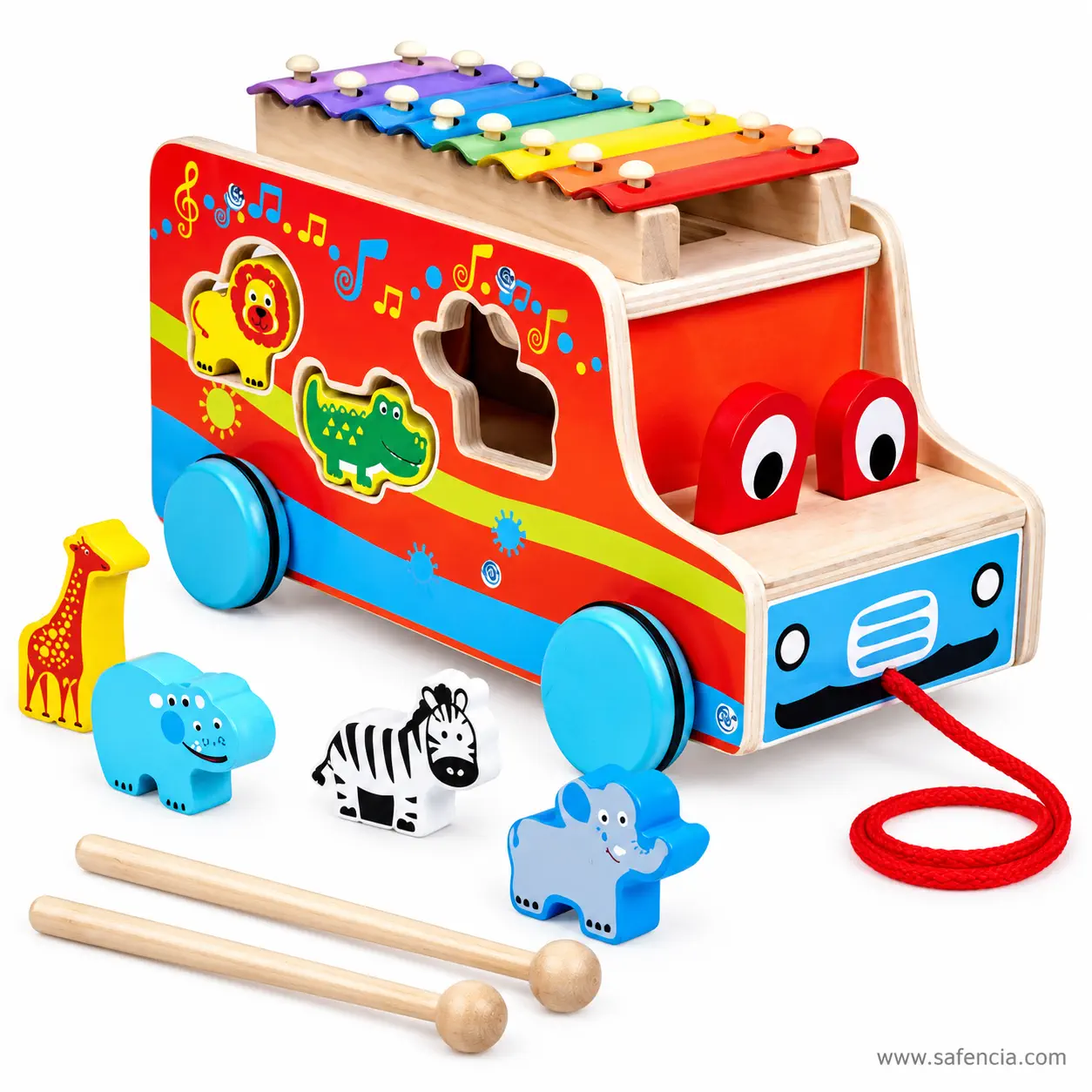Side view of the wooden xylophone bus showing the animal shaped sorter hole and printed music notes