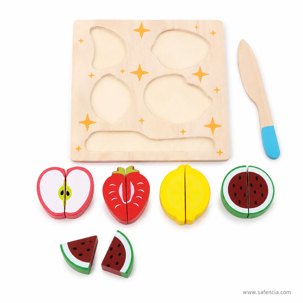 Empty wooden fruit tray with its shaped recesses beside the four fruits and the wooden knife