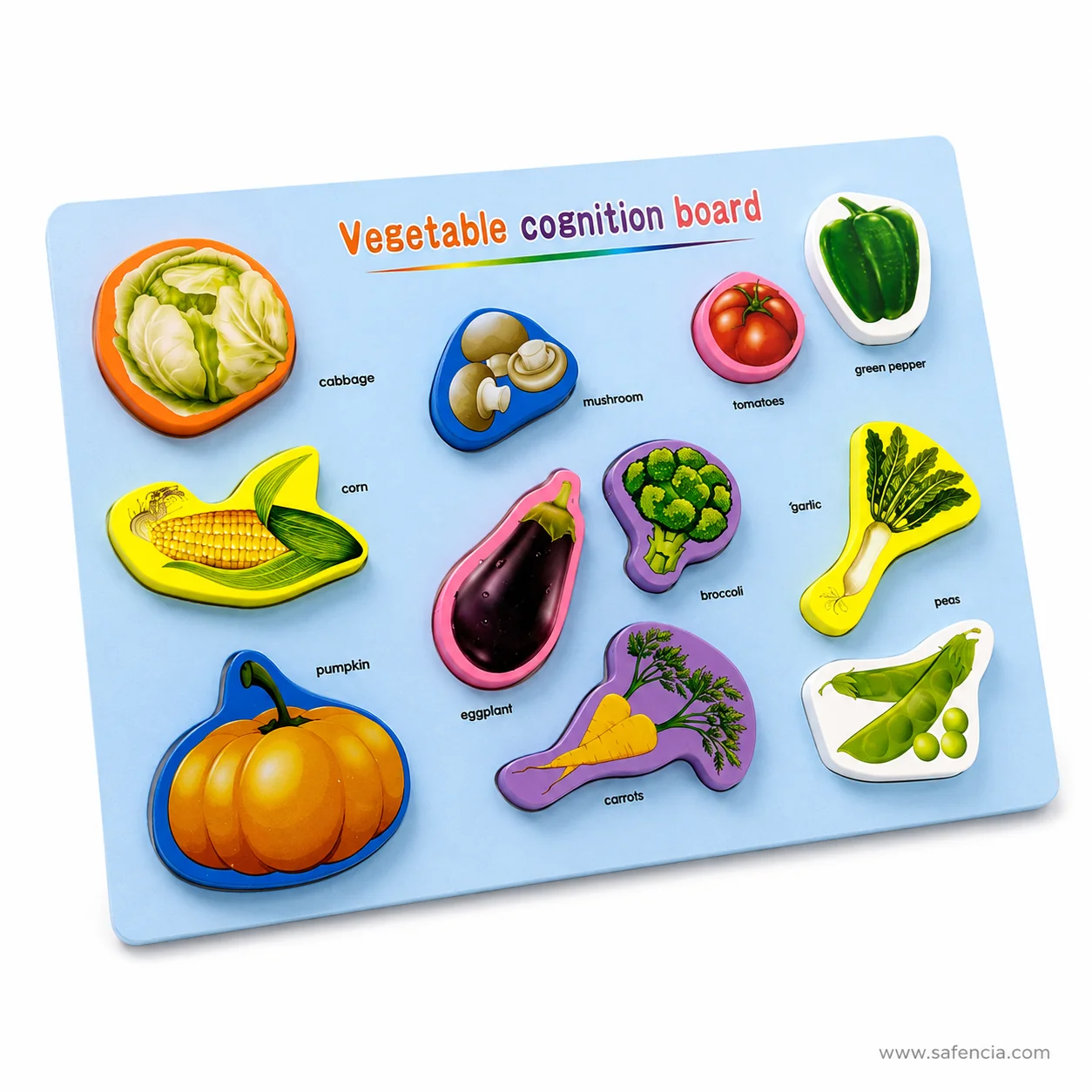 Close angled view of the vegetable board showing the pumpkin, eggplant, broccoli and pea pod artwork