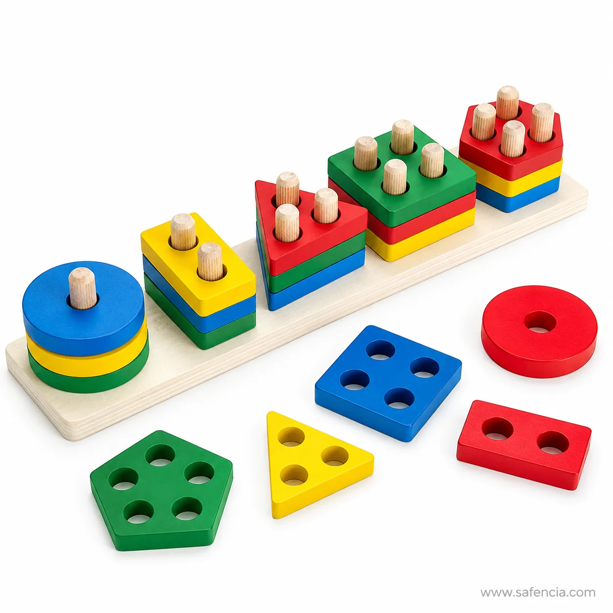 Geometric sorter pieces laid loose showing the differing hole counts pierced through each shape