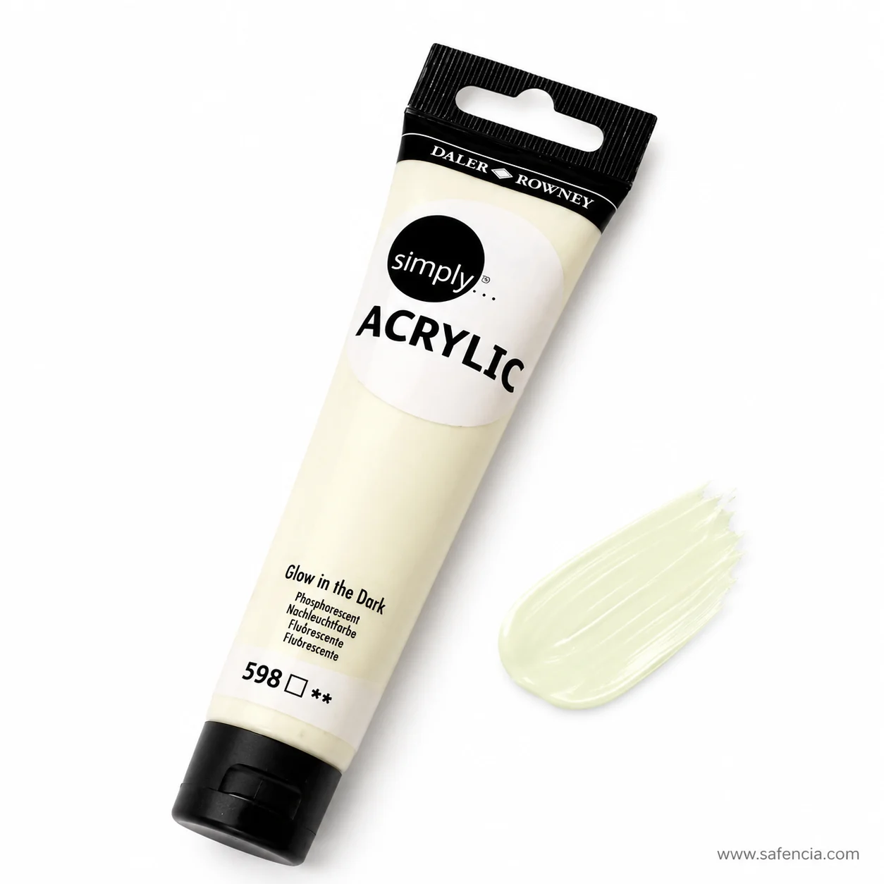Daler-Rowney glow in the dark acrylic tube lying beside a pale cream-green swatch of the paint
