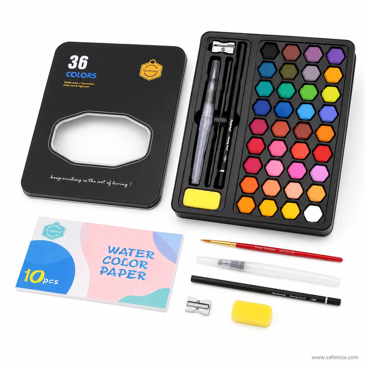 Keep Smiling tin open showing thirty-six hexagonal watercolour pans beside the in-tray sharpener slot