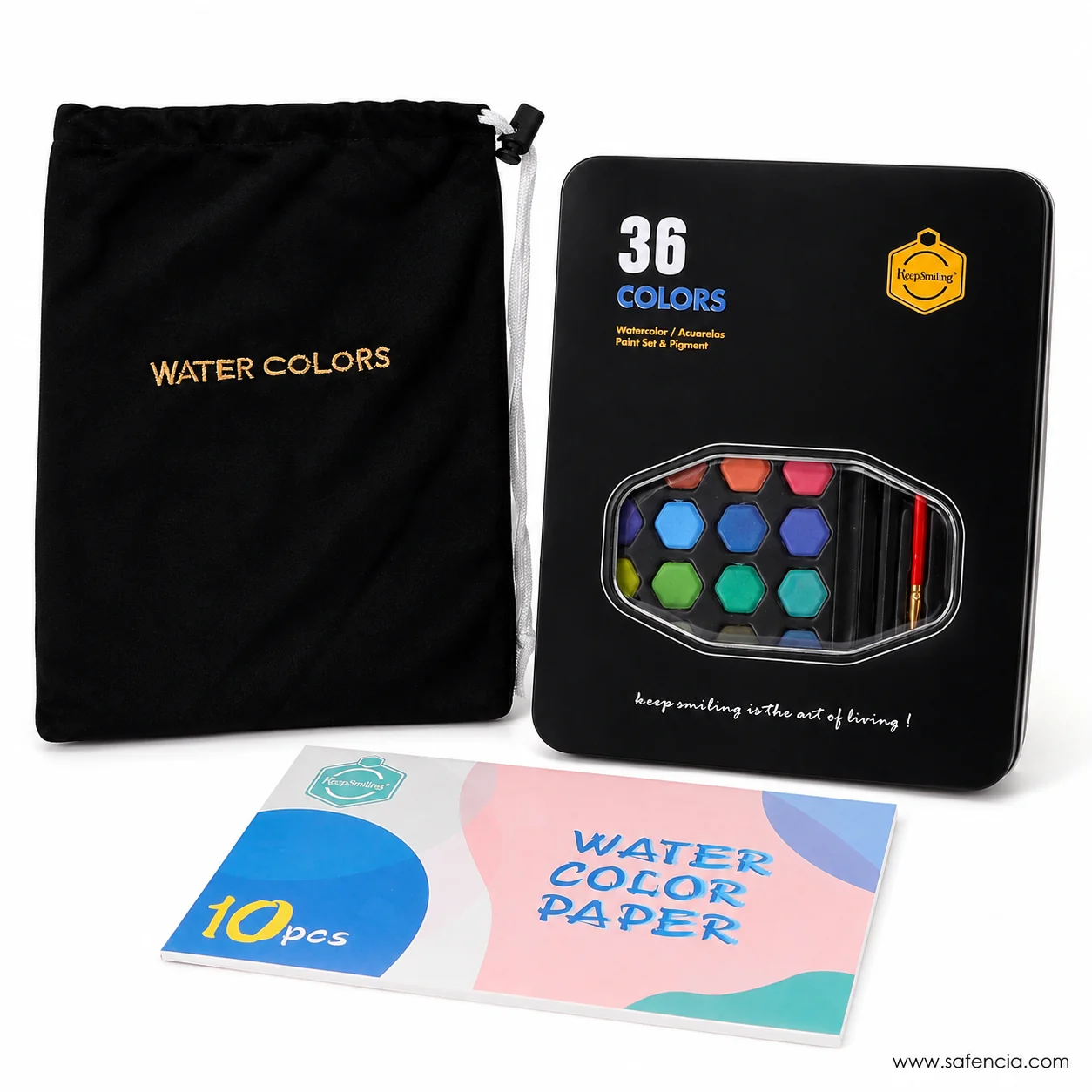 Keep Smiling 36 colour tin standing beside the black velvet pouch and the ten-sheet watercolour pad