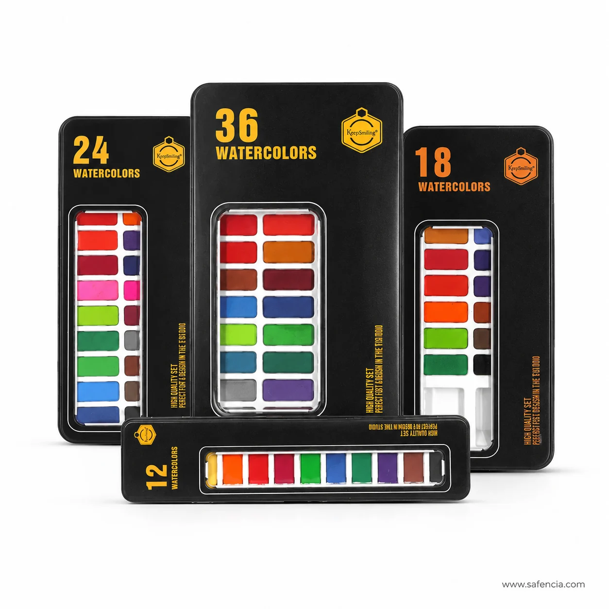 Close view of the gold colour counts and KeepSmiling hexagonal badge across the four watercolour tins