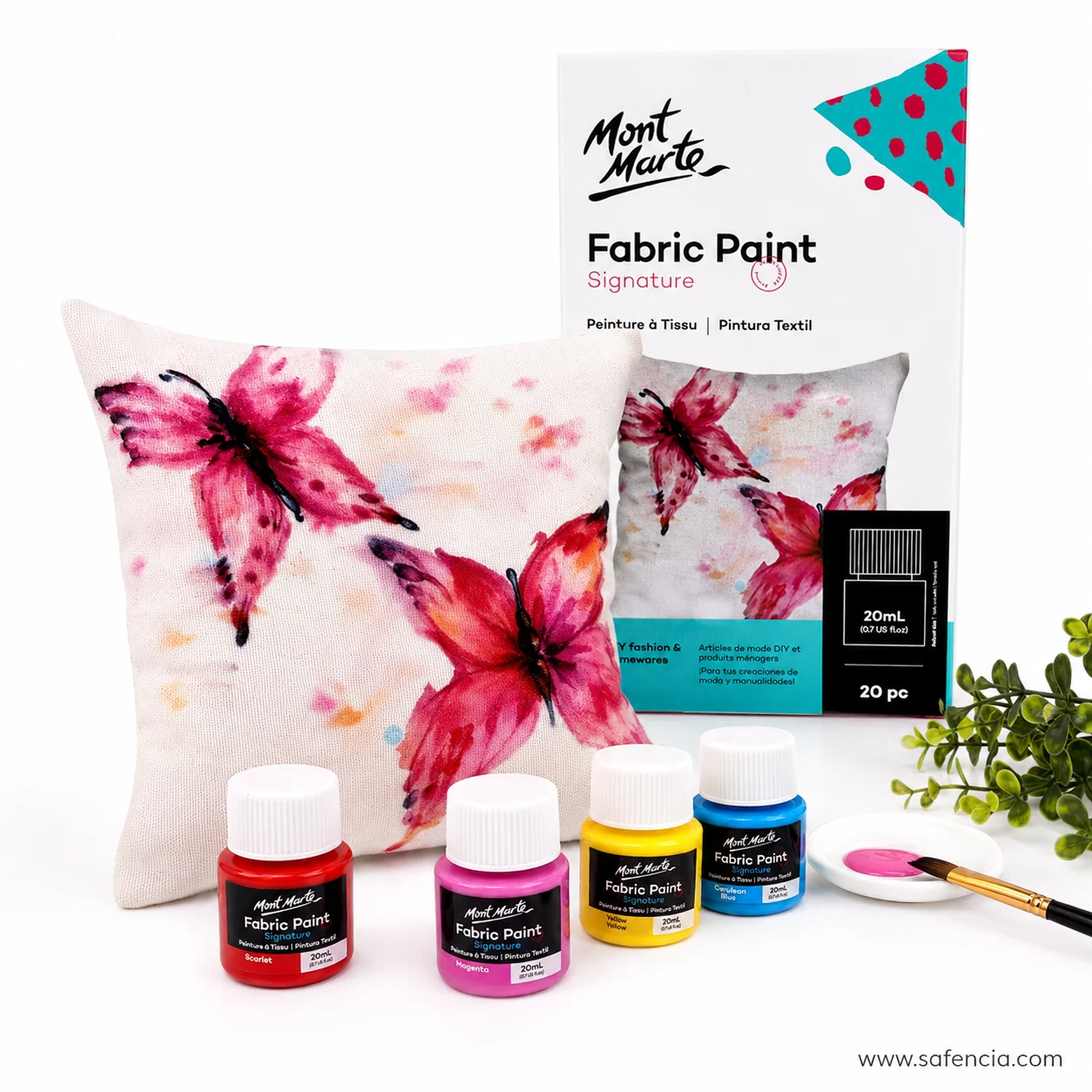 Mont Marte Fabric Paint Signature carton beside a cushion cover painted with large pink lilies