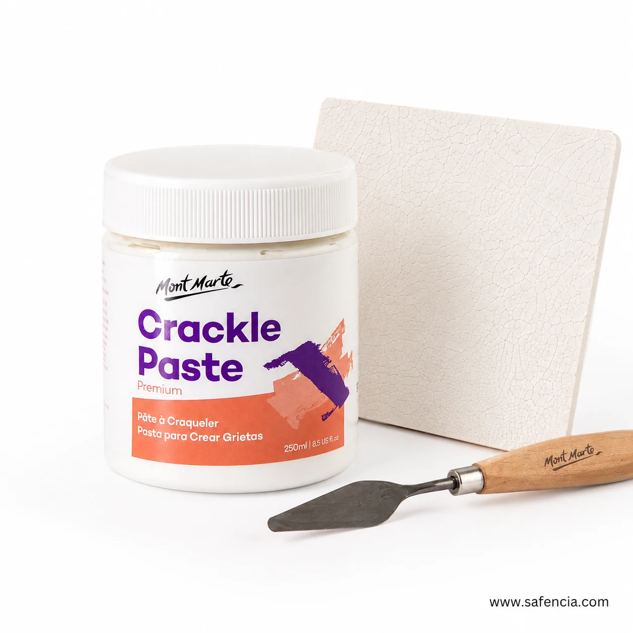 Close view of the crackle paste jar label reading Pate a Craqueler beside a cracked panel