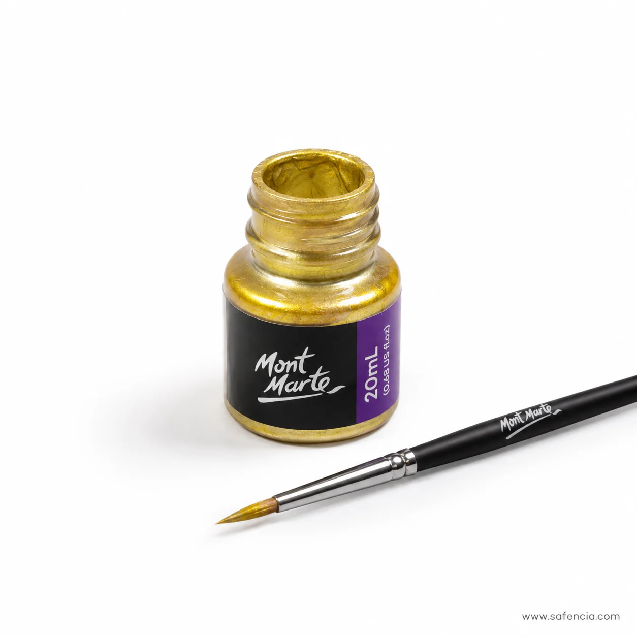 Open bottle of gold foil paint standing beside a loaded fine round detail brush