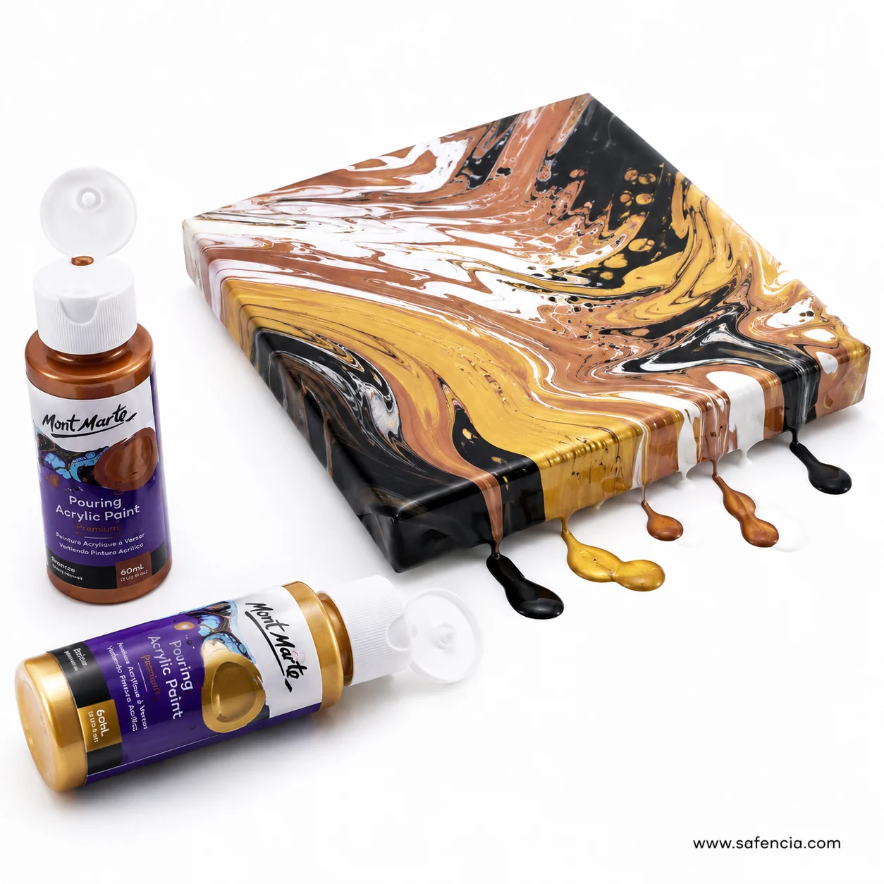 Finished pour of black gold bronze and white on canvas beside two Mont Marte Celestial paint bottles
