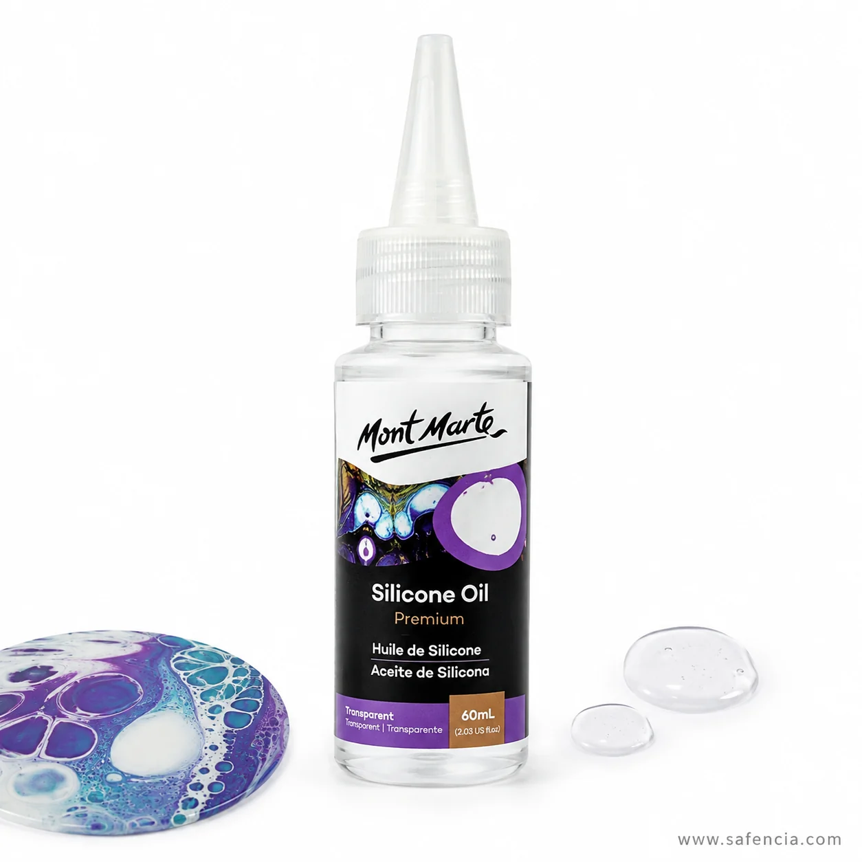 Silicone oil bottle beside a poured acrylic panel covered in open ringed cells and two clear beads