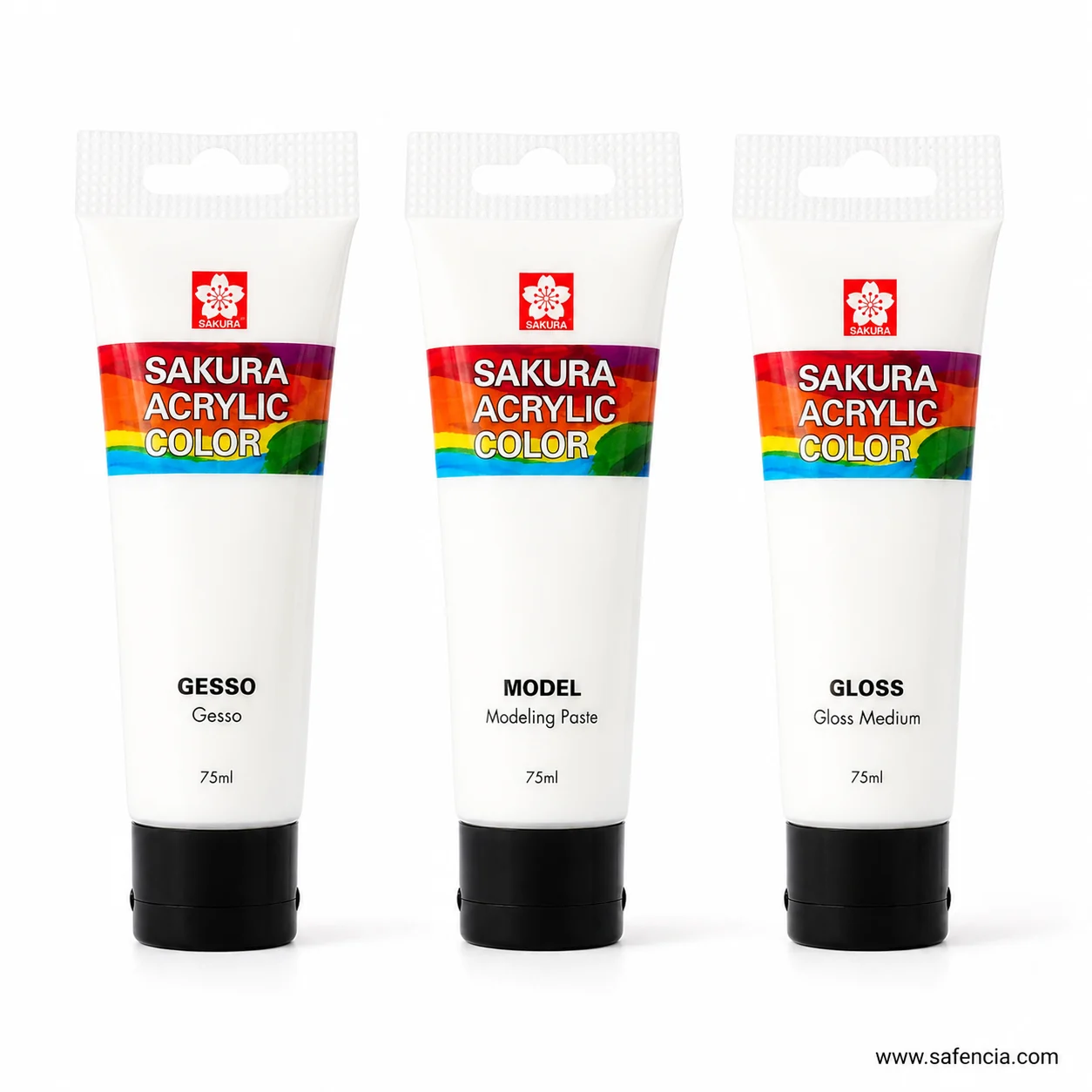 Sakura acrylic medium tubes standing on their black screw caps showing the hanging card tops