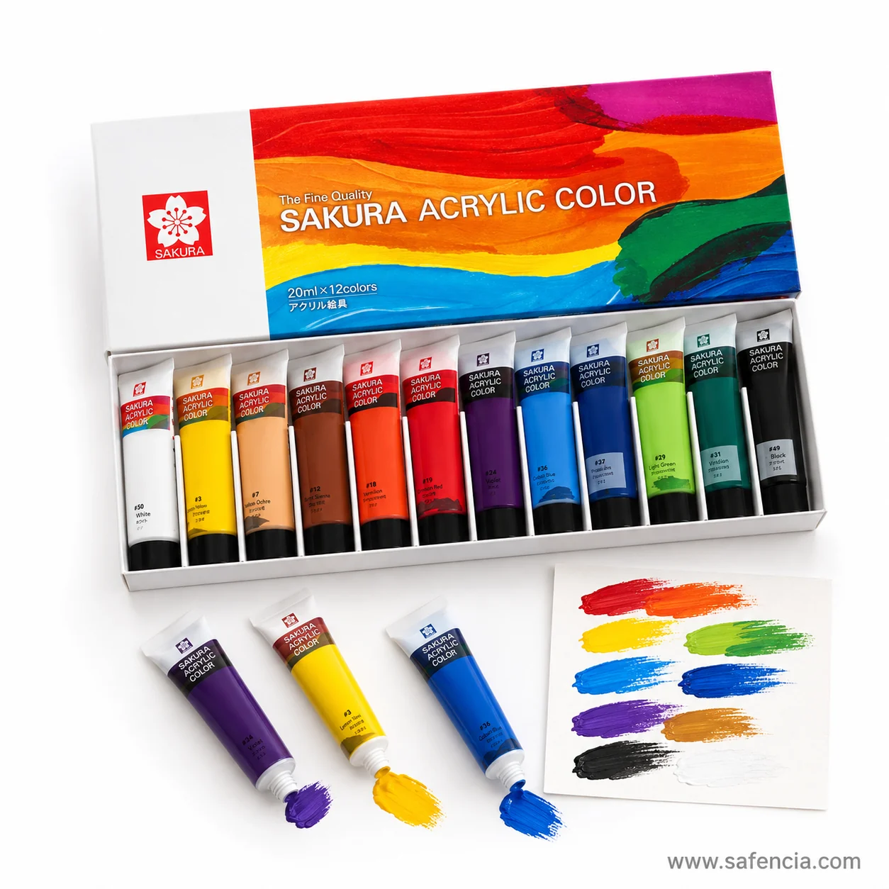 Sakura acrylic carton and tray with three loose tubes squeezed out beside a card of painted swatches