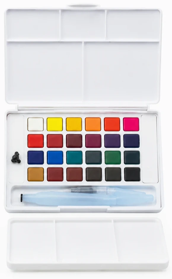 Close view of the Koi 24 palette with twenty-four half pans, the refillable water brush and the black sponge