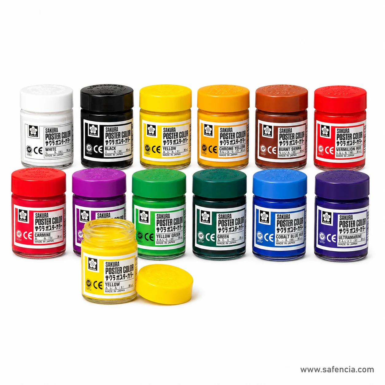 Twelve Sakura Poster Color jars ranged in two rows with the shade names readable on the labels